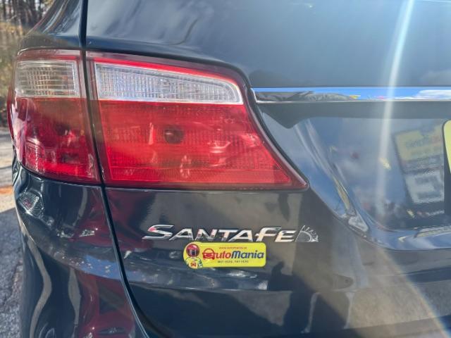 2016 Blue Hyundai Santa Fe SE AWD (KM8SMDHF4GU) with an 3.3L V6 DOHC 24V engine, 6-Speed Automatic transmission, located at 1806 Veterans Memorial Hwy SW, Austell, GA, 30168, (770) 944-9558, 33.817959, -84.606987 - Photo#14