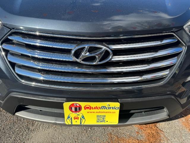 2016 Blue Hyundai Santa Fe SE AWD (KM8SMDHF4GU) with an 3.3L V6 DOHC 24V engine, 6-Speed Automatic transmission, located at 1806 Veterans Memorial Hwy SW, Austell, GA, 30168, (770) 944-9558, 33.817959, -84.606987 - Photo#15