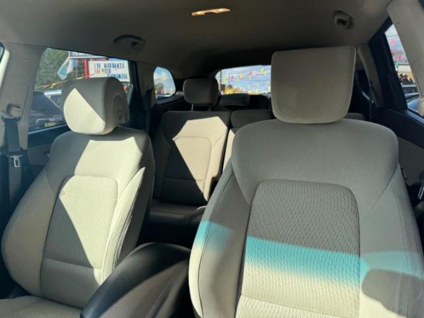2016 Blue Hyundai Santa Fe SE AWD (KM8SMDHF4GU) with an 3.3L V6 DOHC 24V engine, 6-Speed Automatic transmission, located at 1806 Veterans Memorial Hwy SW, Austell, GA, 30168, (770) 944-9558, 33.817959, -84.606987 - Photo#7
