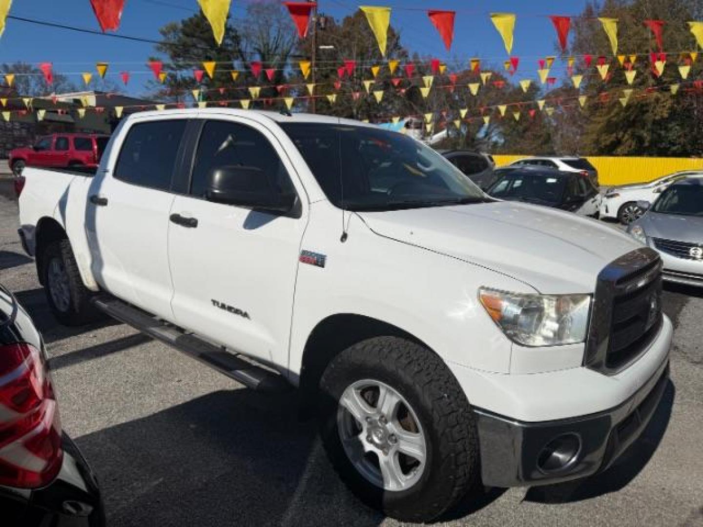 2013 White Toyota Tundra Tundra-Grade CrewMax 5.7L FFV 4WD (5TFDW5F11DX) with an 5.7L V8 DOHC 32V FFV engine, 6-Speed Automatic Overdrive transmission, located at 1806 Veterans Memorial Hwy SW, Austell, GA, 30168, (770) 944-9558, 33.817959, -84.606987 - Photo#2
