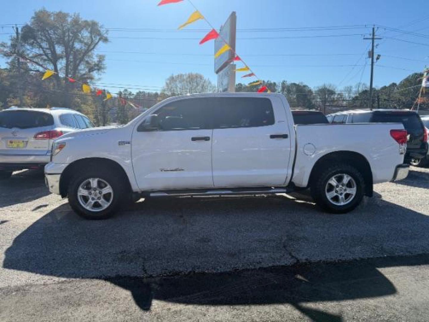 2013 White Toyota Tundra Tundra-Grade CrewMax 5.7L FFV 4WD (5TFDW5F11DX) with an 5.7L V8 DOHC 32V FFV engine, 6-Speed Automatic Overdrive transmission, located at 1806 Veterans Memorial Hwy SW, Austell, GA, 30168, (770) 944-9558, 33.817959, -84.606987 - Photo#3