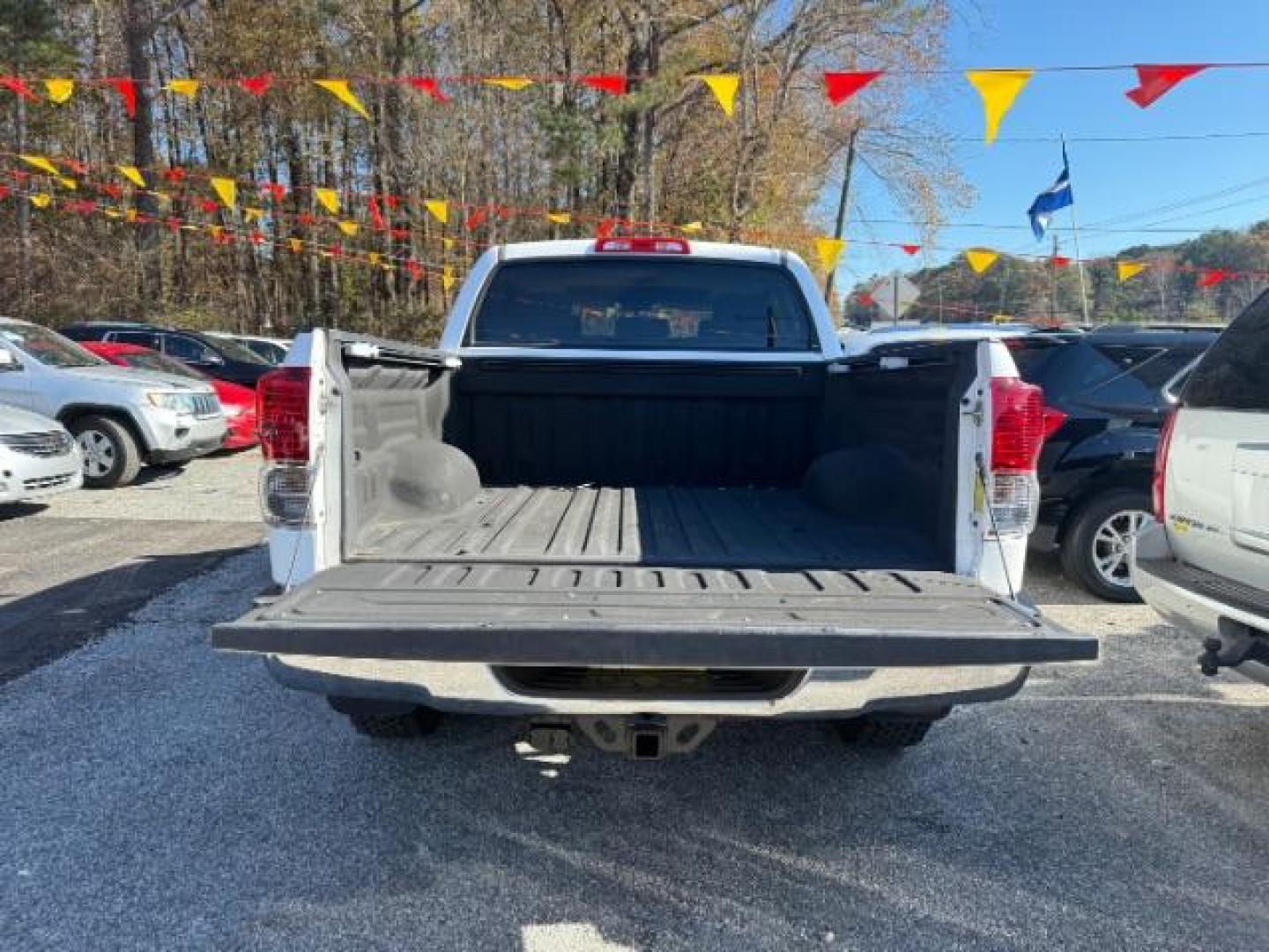 2013 White Toyota Tundra Tundra-Grade CrewMax 5.7L FFV 4WD (5TFDW5F11DX) with an 5.7L V8 DOHC 32V FFV engine, 6-Speed Automatic Overdrive transmission, located at 1806 Veterans Memorial Hwy SW, Austell, GA, 30168, (770) 944-9558, 33.817959, -84.606987 - Photo#5