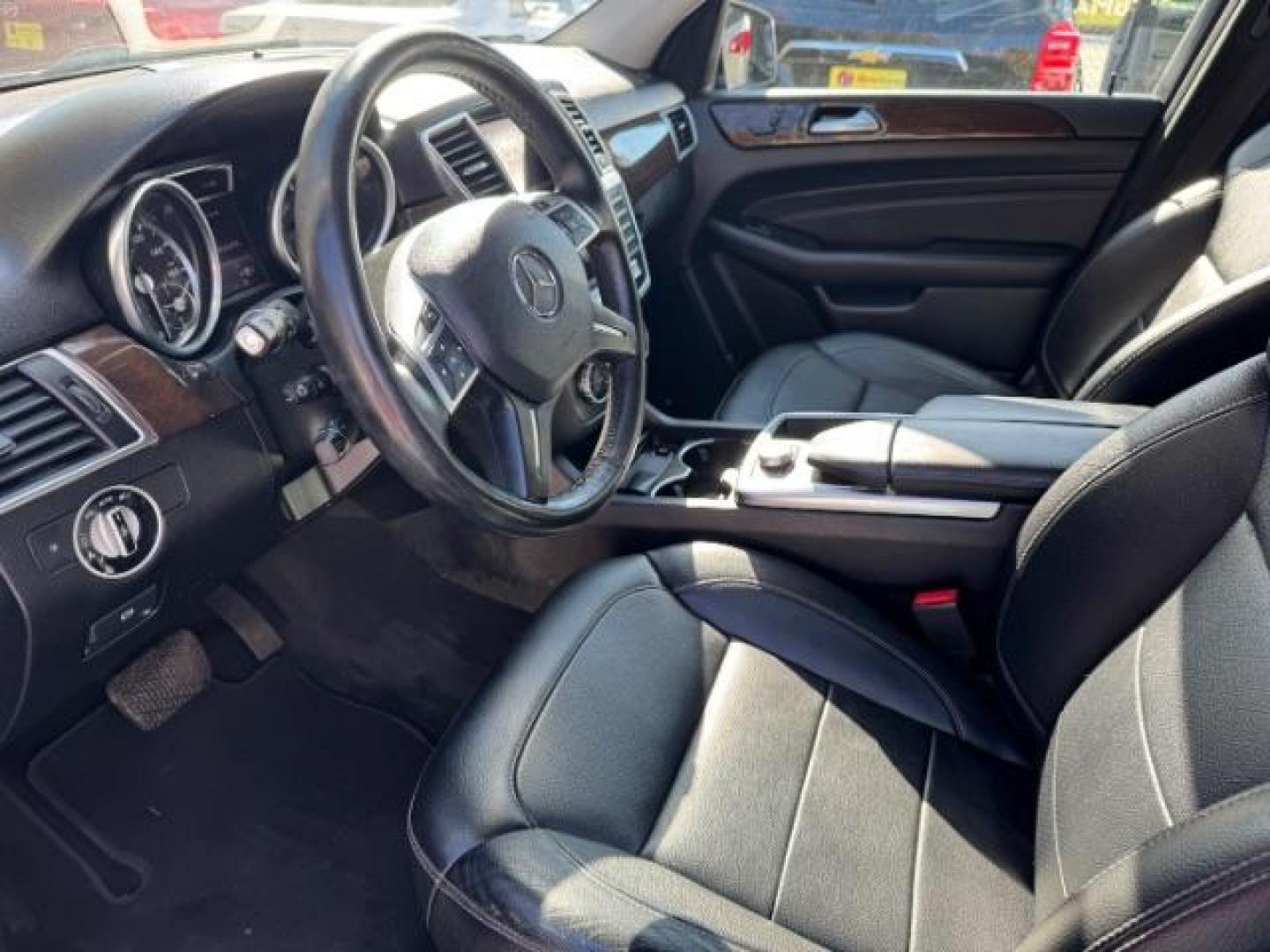 2014 Black Mercedes-Benz M-Class ML350 4MATIC (4JGDA5HB4EA) with an 3.5L V6 DOHC 24V engine, 7-Speed Automatic transmission, located at 1806 Veterans Memorial Hwy SW, Austell, GA, 30168, (770) 944-9558, 33.817959, -84.606987 - Photo#4