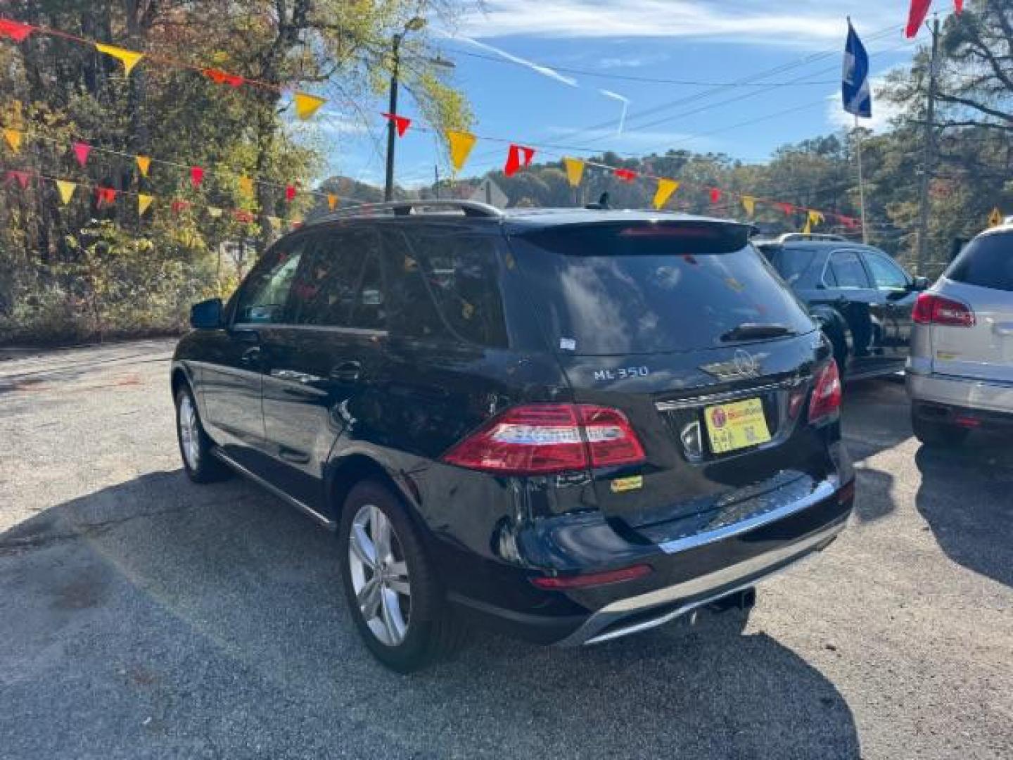 2014 Black Mercedes-Benz M-Class ML350 4MATIC (4JGDA5HB4EA) with an 3.5L V6 DOHC 24V engine, 7-Speed Automatic transmission, located at 1806 Veterans Memorial Hwy SW, Austell, GA, 30168, (770) 944-9558, 33.817959, -84.606987 - Photo#6