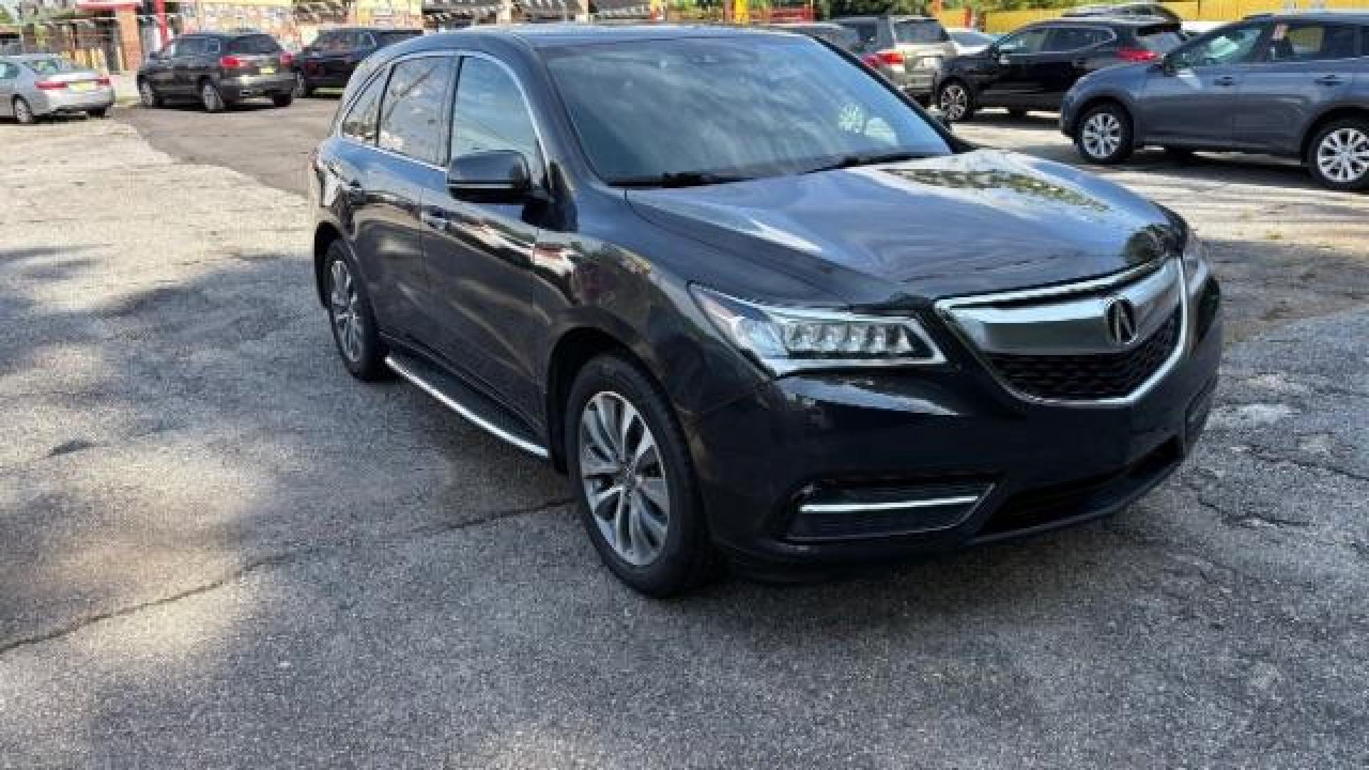 2016 Gray Acura MDX 9-Spd AT w/ Tech and A (5FRYD3H41GB) with an 3.5L V6 SOHC 24V engine, 9-Speed Automatic transmission, located at 1806 Veterans Memorial Hwy SW, Austell, GA, 30168, (770) 944-9558, 33.817959, -84.606987 - Photo#2