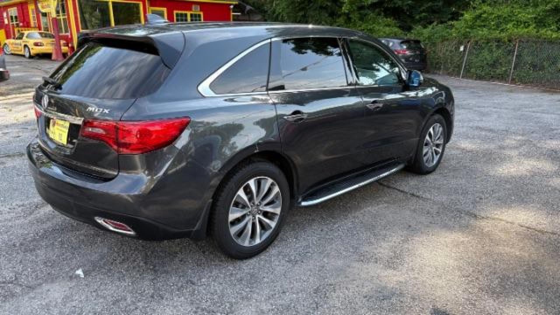 2016 Gray Acura MDX 9-Spd AT w/ Tech and A (5FRYD3H41GB) with an 3.5L V6 SOHC 24V engine, 9-Speed Automatic transmission, located at 1806 Veterans Memorial Hwy SW, Austell, GA, 30168, (770) 944-9558, 33.817959, -84.606987 - Photo#3