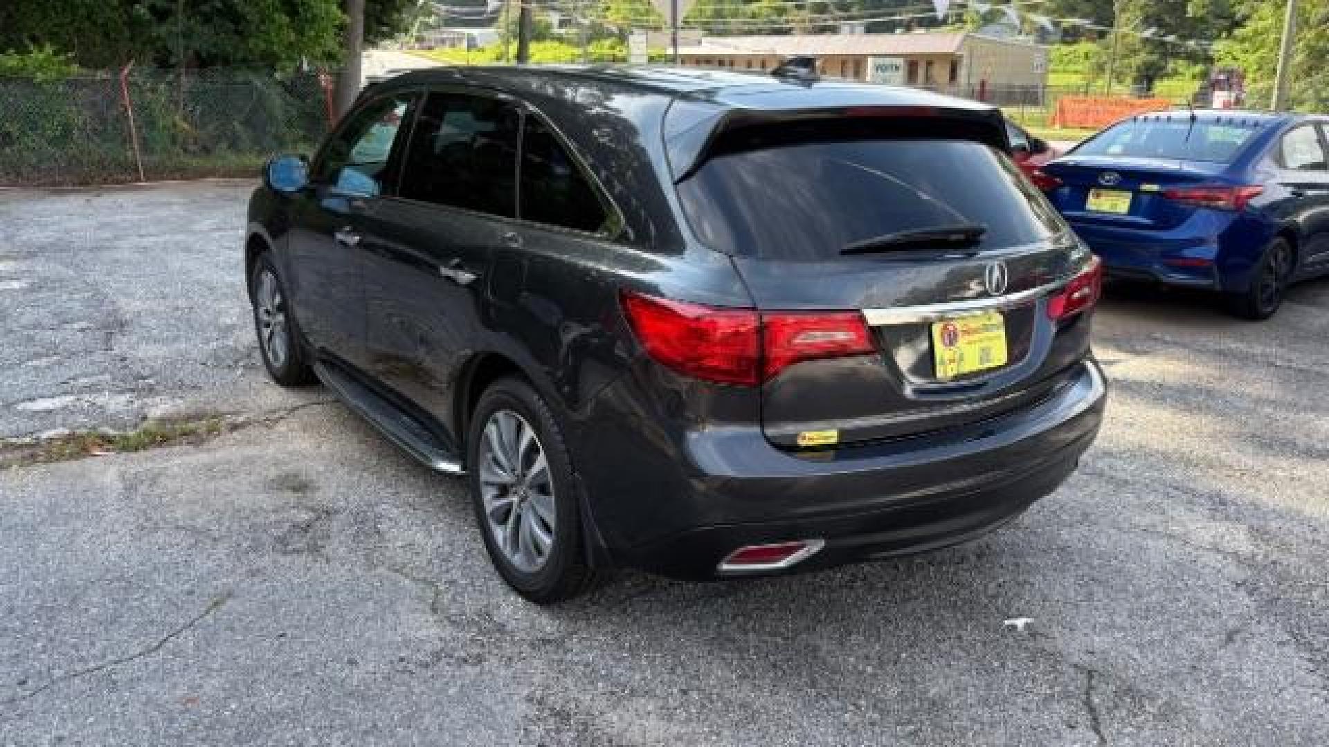 2016 Gray Acura MDX 9-Spd AT w/ Tech and A (5FRYD3H41GB) with an 3.5L V6 SOHC 24V engine, 9-Speed Automatic transmission, located at 1806 Veterans Memorial Hwy SW, Austell, GA, 30168, (770) 944-9558, 33.817959, -84.606987 - Photo#5