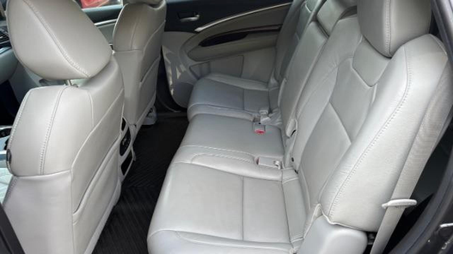 2016 Gray Acura MDX 9-Spd AT w/ Tech and A (5FRYD3H41GB) with an 3.5L V6 SOHC 24V engine, 9-Speed Automatic transmission, located at 1806 Veterans Memorial Hwy SW, Austell, GA, 30168, (770) 944-9558, 33.817959, -84.606987 - Photo#6
