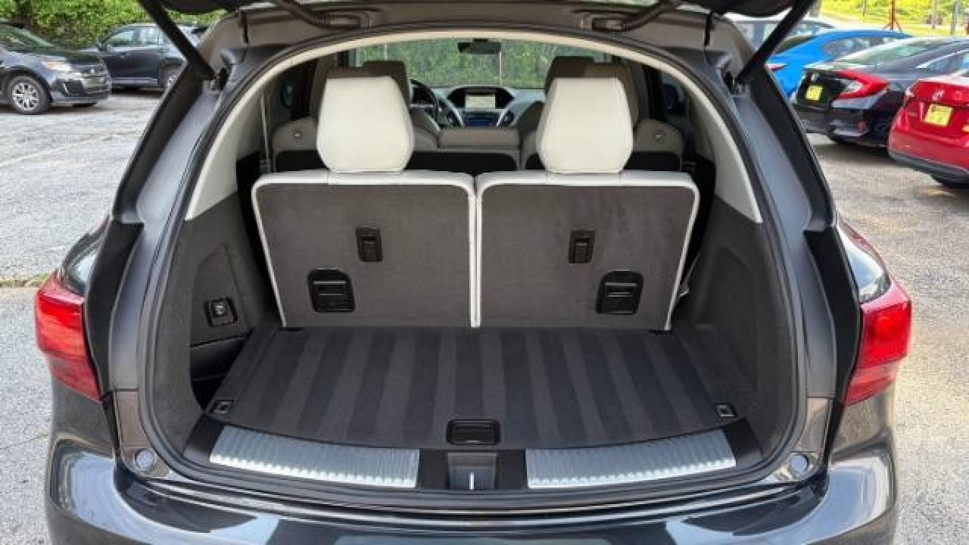 2016 Gray Acura MDX 9-Spd AT w/ Tech and A (5FRYD3H41GB) with an 3.5L V6 SOHC 24V engine, 9-Speed Automatic transmission, located at 1806 Veterans Memorial Hwy SW, Austell, GA, 30168, (770) 944-9558, 33.817959, -84.606987 - Photo#14