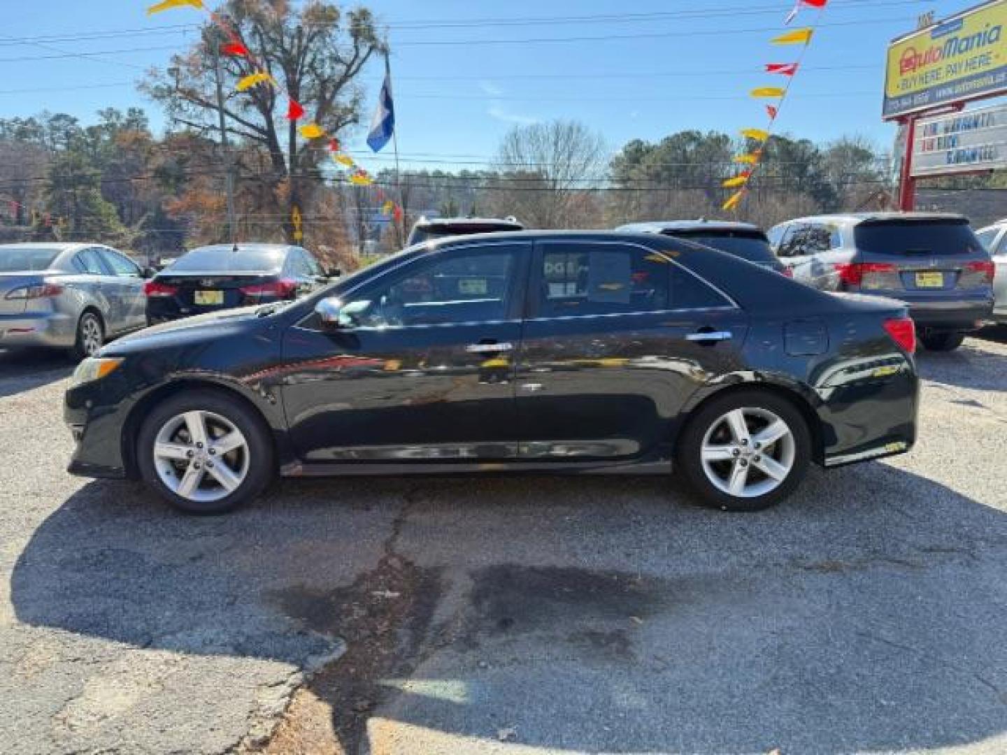 2012 Green Toyota Camry SE (4T1BF1FK9CU) with an 2.5L L4 DOHC 16V engine, 6-Speed Automatic transmission, located at 1806 Veterans Memorial Hwy SW, Austell, GA, 30168, (770) 944-9558, 33.817959, -84.606987 - Photo#2