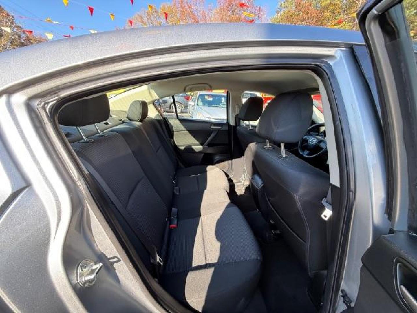 2013 Silver Mazda MAZDA3 i SV MT 4-Door (JM1BL1TF6D1) with an 2.0L L4 DOHC 16V engine, 5-Speed Manual transmission, located at 1806 Veterans Memorial Hwy SW, Austell, GA, 30168, (770) 944-9558, 33.817959, -84.606987 - Photo#5