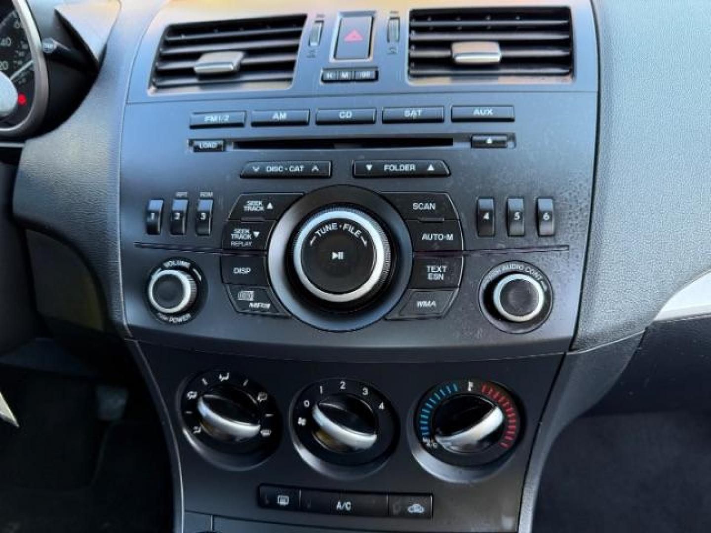 2013 Silver Mazda MAZDA3 i SV MT 4-Door (JM1BL1TF6D1) with an 2.0L L4 DOHC 16V engine, 5-Speed Manual transmission, located at 1806 Veterans Memorial Hwy SW, Austell, GA, 30168, (770) 944-9558, 33.817959, -84.606987 - Photo#8