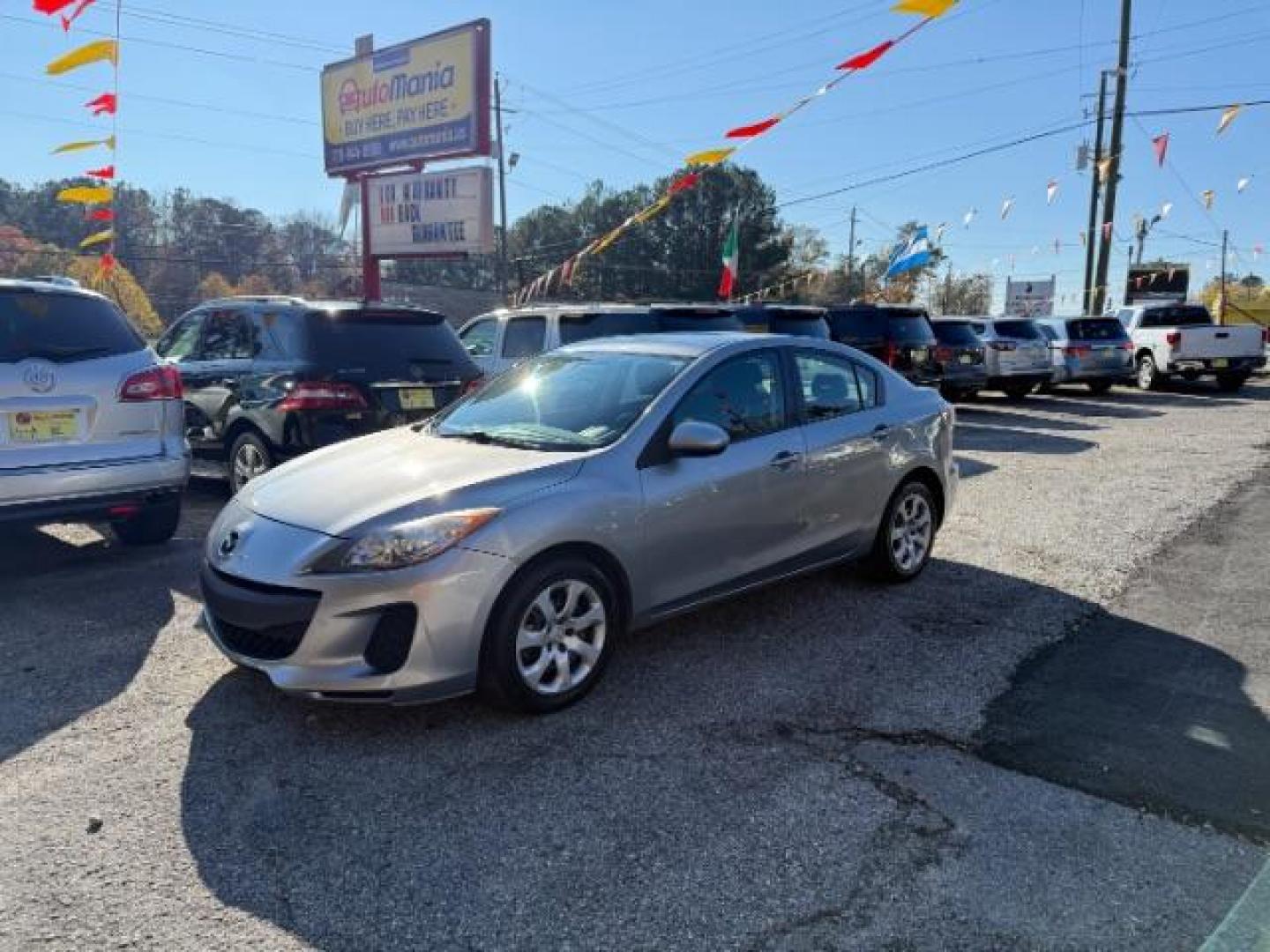 2013 Silver Mazda MAZDA3 i SV MT 4-Door (JM1BL1TF6D1) with an 2.0L L4 DOHC 16V engine, 5-Speed Manual transmission, located at 1806 Veterans Memorial Hwy SW, Austell, GA, 30168, (770) 944-9558, 33.817959, -84.606987 - Photo#0