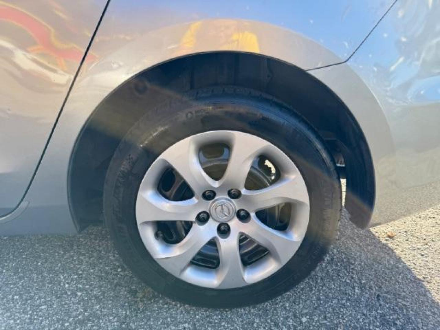 2013 Silver Mazda MAZDA3 i SV MT 4-Door (JM1BL1TF6D1) with an 2.0L L4 DOHC 16V engine, 5-Speed Manual transmission, located at 1806 Veterans Memorial Hwy SW, Austell, GA, 30168, (770) 944-9558, 33.817959, -84.606987 - Photo#18