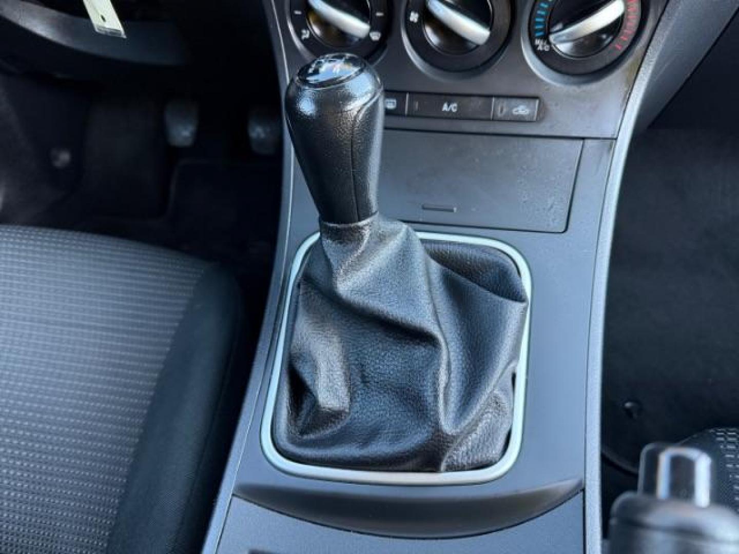 2013 Silver Mazda MAZDA3 i SV MT 4-Door (JM1BL1TF6D1) with an 2.0L L4 DOHC 16V engine, 5-Speed Manual transmission, located at 1806 Veterans Memorial Hwy SW, Austell, GA, 30168, (770) 944-9558, 33.817959, -84.606987 - Photo#7
