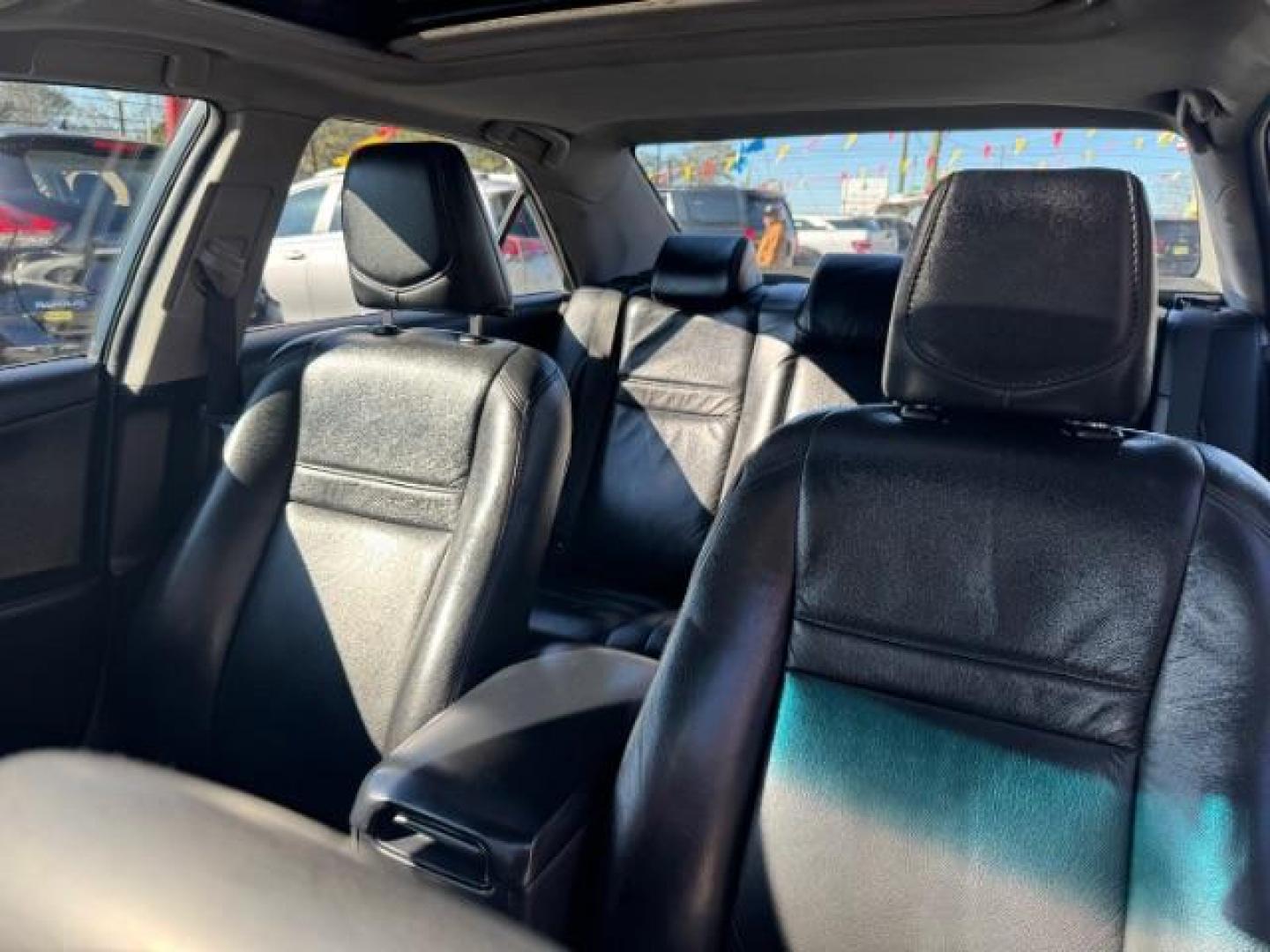2014 Silver Toyota Camry SE (4T1BF1FK4EU) with an 2.5L L4 DOHC 16V engine, 6-Speed Automatic transmission, located at 1806 Veterans Memorial Hwy SW, Austell, GA, 30168, (770) 944-9558, 33.817959, -84.606987 - Photo#7