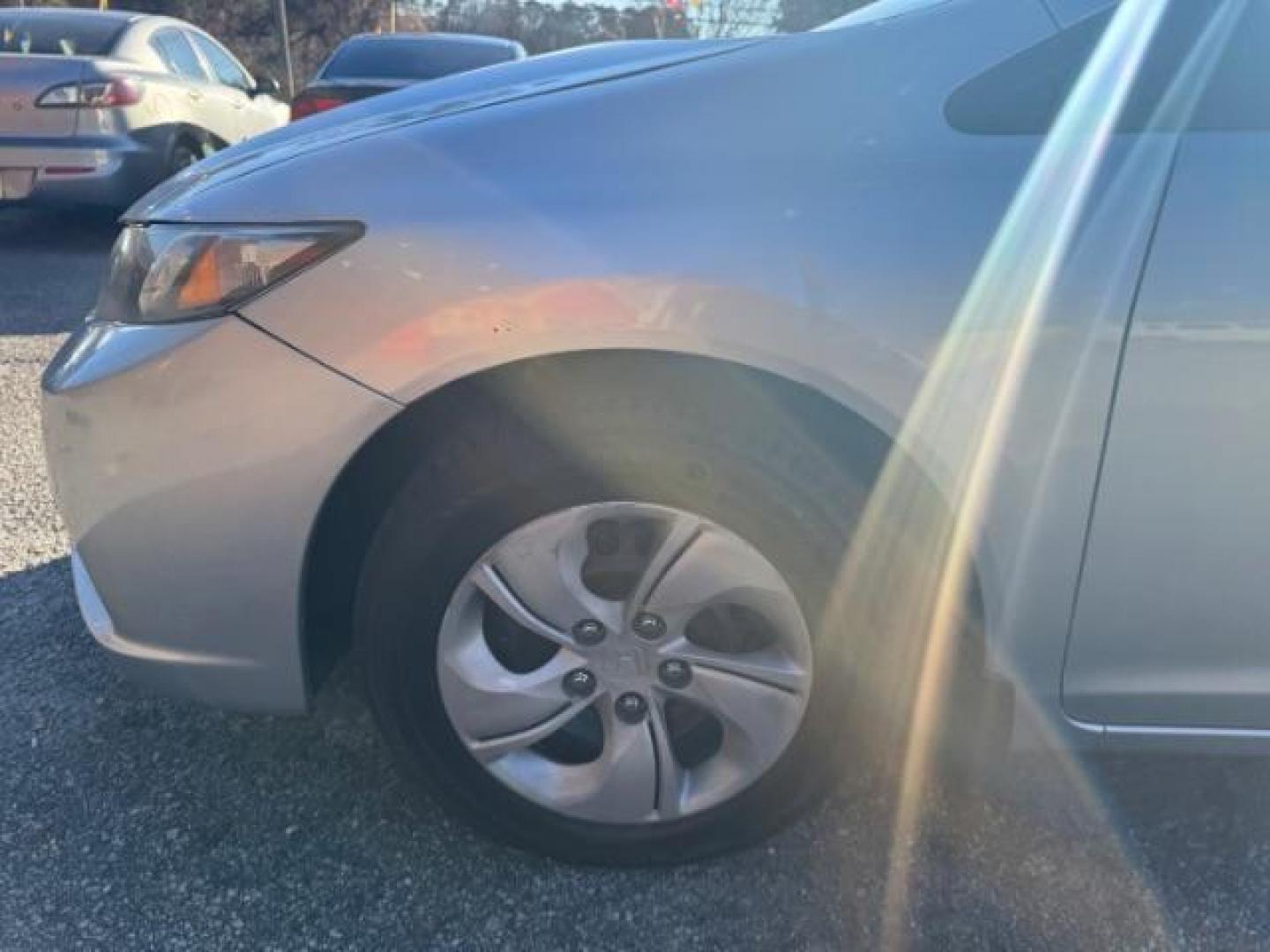 2013 Silver Honda Civic LX Sedan 5-Speed AT (19XFB2F59DE) with an 1.8L L4 SOHC 16V engine, 5-Speed Automatic transmission, located at 1806 Veterans Memorial Hwy SW, Austell, GA, 30168, (770) 944-9558, 33.817959, -84.606987 - Photo#16