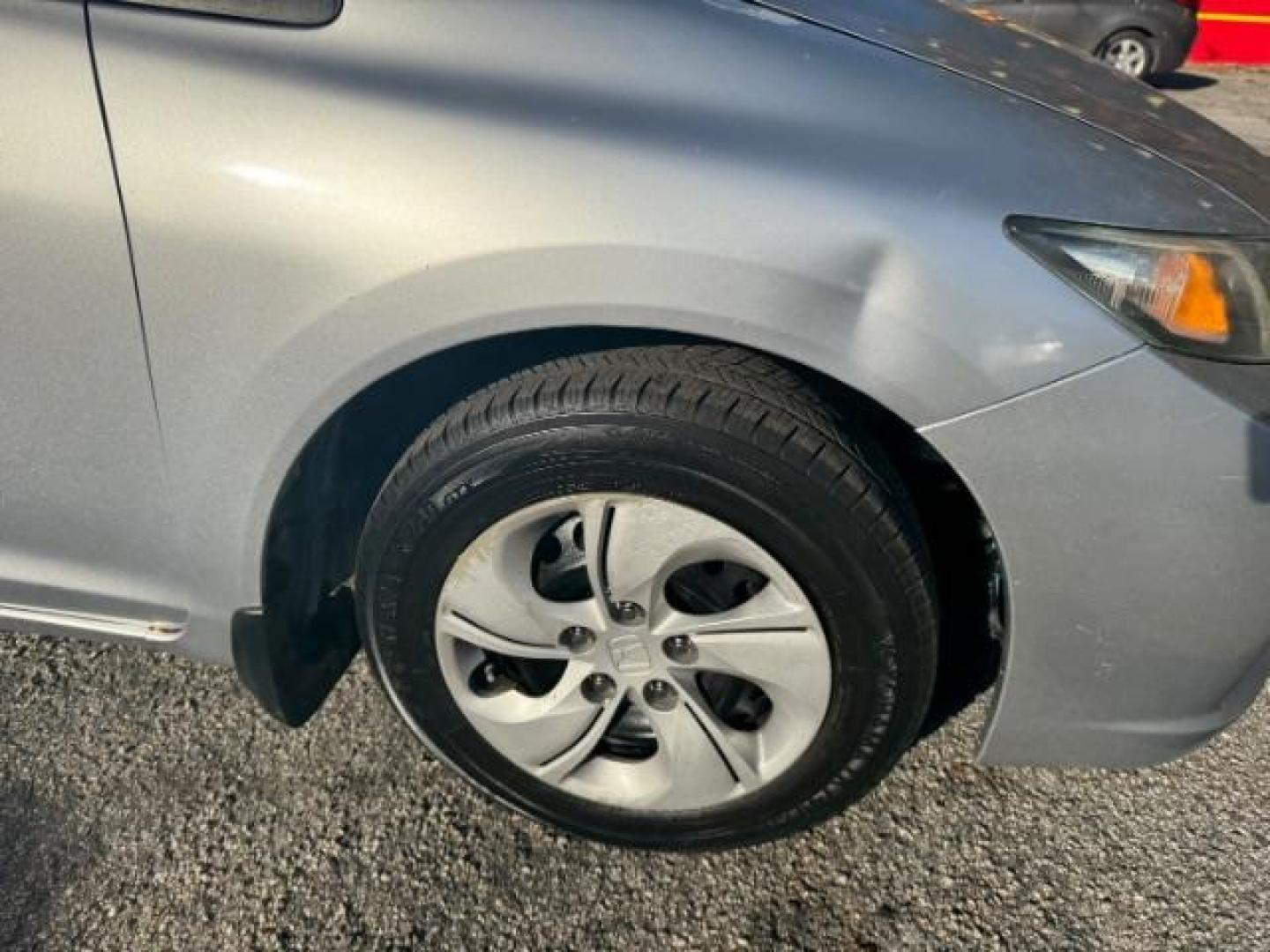 2013 Silver Honda Civic LX Sedan 5-Speed AT (19XFB2F59DE) with an 1.8L L4 SOHC 16V engine, 5-Speed Automatic transmission, located at 1806 Veterans Memorial Hwy SW, Austell, GA, 30168, (770) 944-9558, 33.817959, -84.606987 - Photo#18