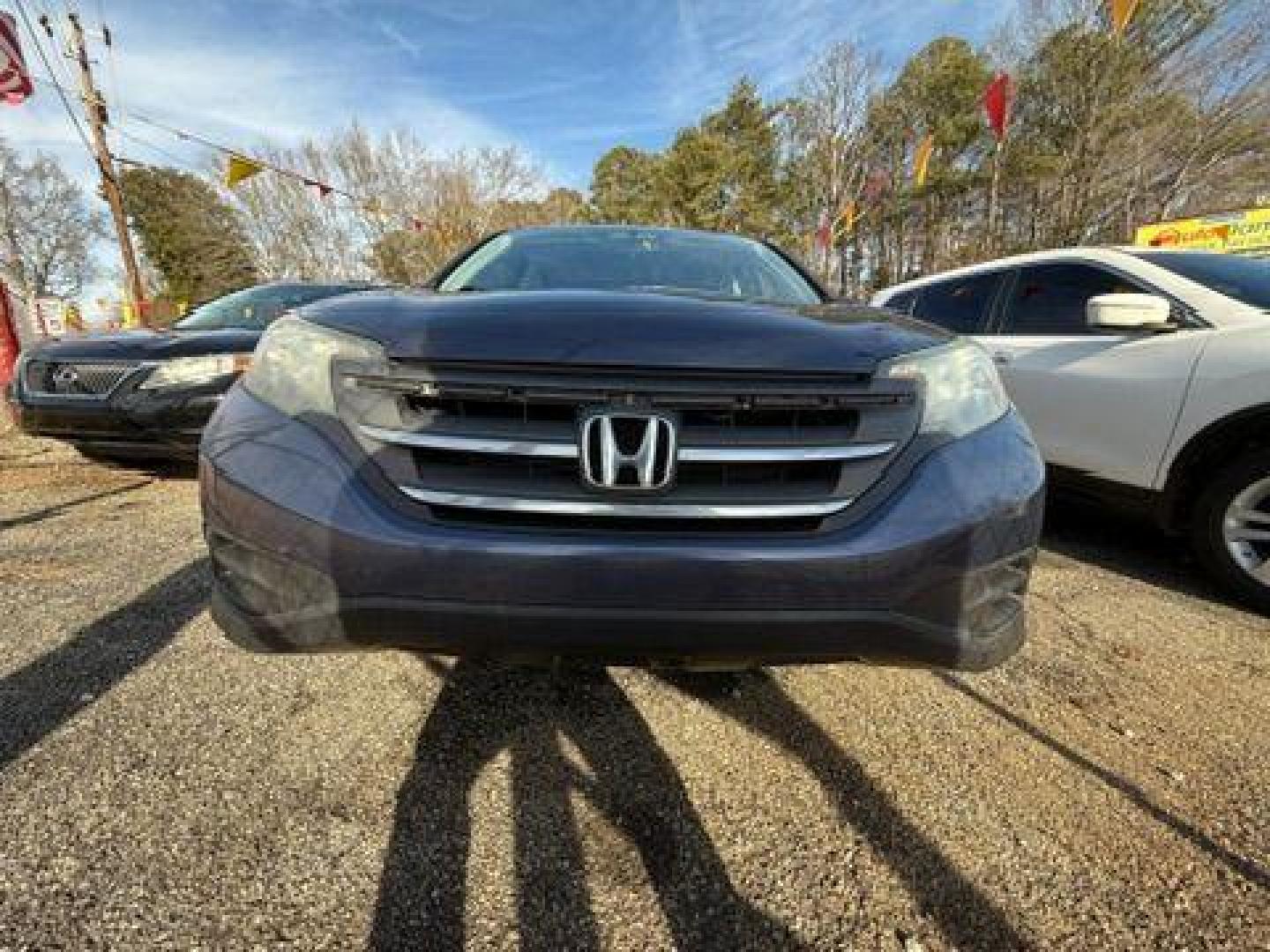 2014 Blue Honda CR-V LX 2WD 5-Speed AT (2HKRM3H35EH) with an 2.4L L4 DOHC 16V engine, 5-Speed Automatic transmission, located at 1806 Veterans Memorial Hwy SW, Austell, GA, 30168, (770) 944-9558, 33.817959, -84.606987 - Photo#10