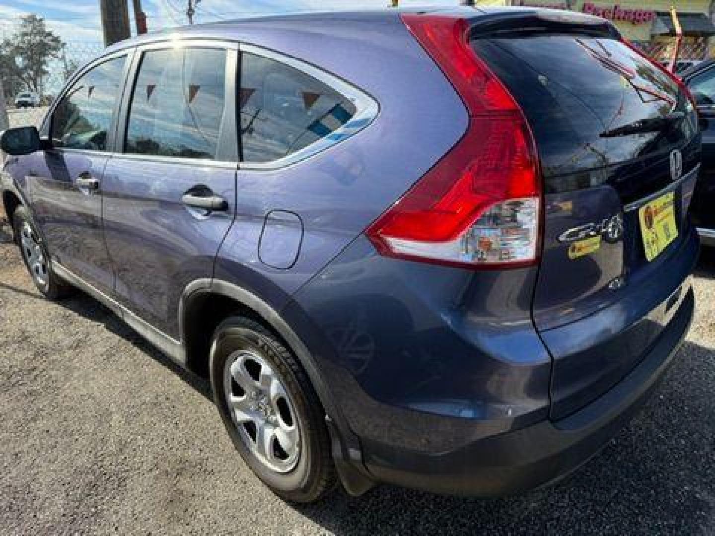 2014 Blue Honda CR-V LX 2WD 5-Speed AT (2HKRM3H35EH) with an 2.4L L4 DOHC 16V engine, 5-Speed Automatic transmission, located at 1806 Veterans Memorial Hwy SW, Austell, GA, 30168, (770) 944-9558, 33.817959, -84.606987 - Photo#3