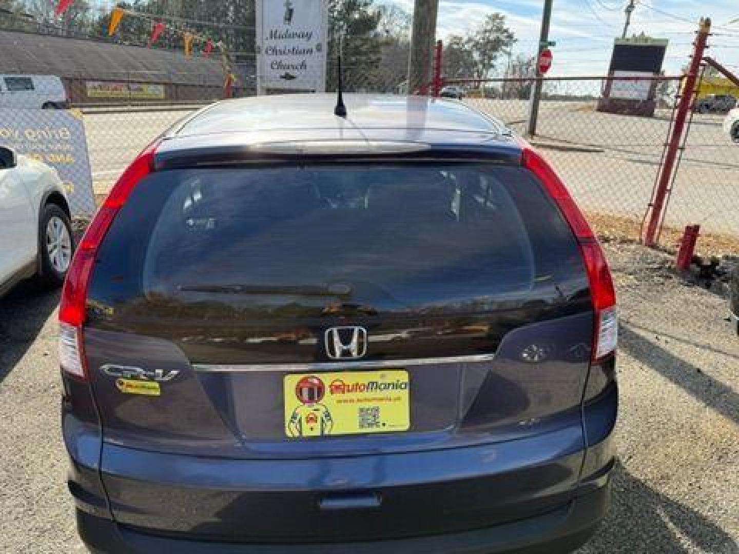 2014 Blue Honda CR-V LX 2WD 5-Speed AT (2HKRM3H35EH) with an 2.4L L4 DOHC 16V engine, 5-Speed Automatic transmission, located at 1806 Veterans Memorial Hwy SW, Austell, GA, 30168, (770) 944-9558, 33.817959, -84.606987 - Photo#4