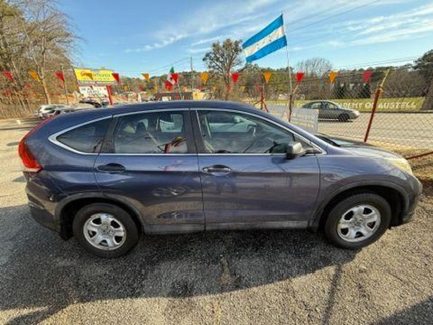 2014 Blue Honda CR-V LX 2WD 5-Speed AT (2HKRM3H35EH) with an 2.4L L4 DOHC 16V engine, 5-Speed Automatic transmission, located at 1806 Veterans Memorial Hwy SW, Austell, GA, 30168, (770) 944-9558, 33.817959, -84.606987 - Photo#6