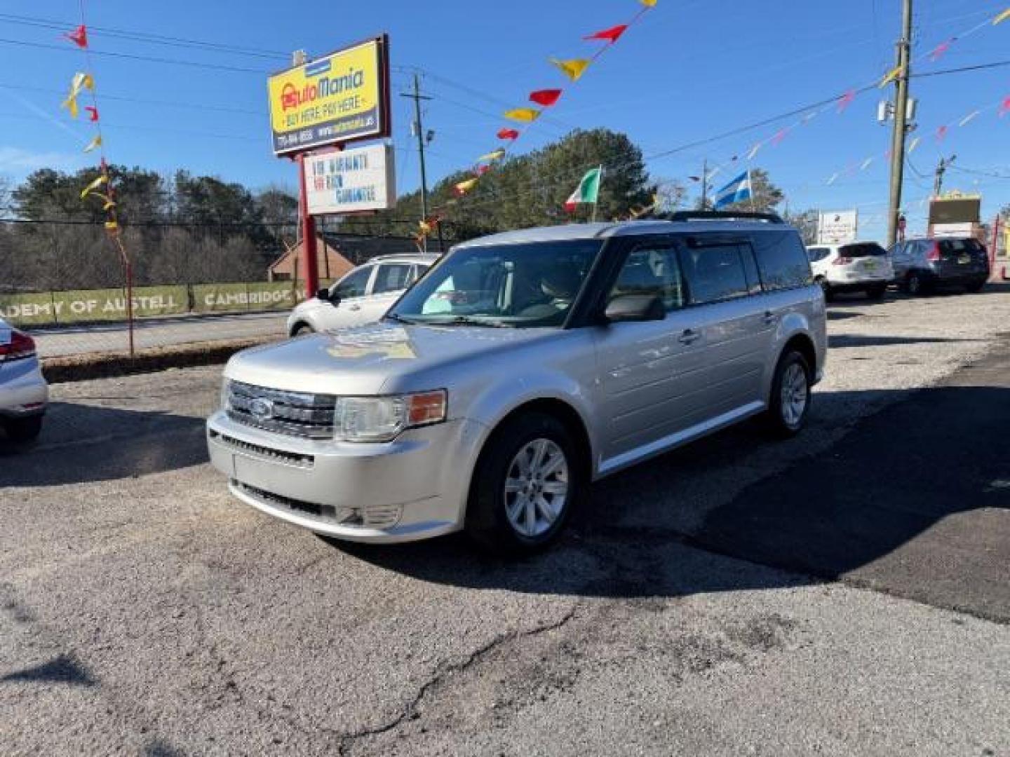 2012 Silver Ford Flex SE FWD (2FMGK5BC4CB) with an 3.5L V6 DOHC 24V engine, 6-Speed Automatic Overdrive transmission, located at 1806 Veterans Memorial Hwy SW, Austell, GA, 30168, (770) 944-9558, 33.817959, -84.606987 - Photo#0
