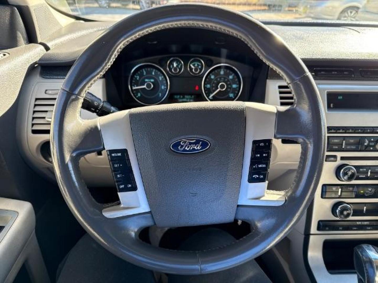 2012 Silver Ford Flex SE FWD (2FMGK5BC4CB) with an 3.5L V6 DOHC 24V engine, 6-Speed Automatic Overdrive transmission, located at 1806 Veterans Memorial Hwy SW, Austell, GA, 30168, (770) 944-9558, 33.817959, -84.606987 - Photo#5