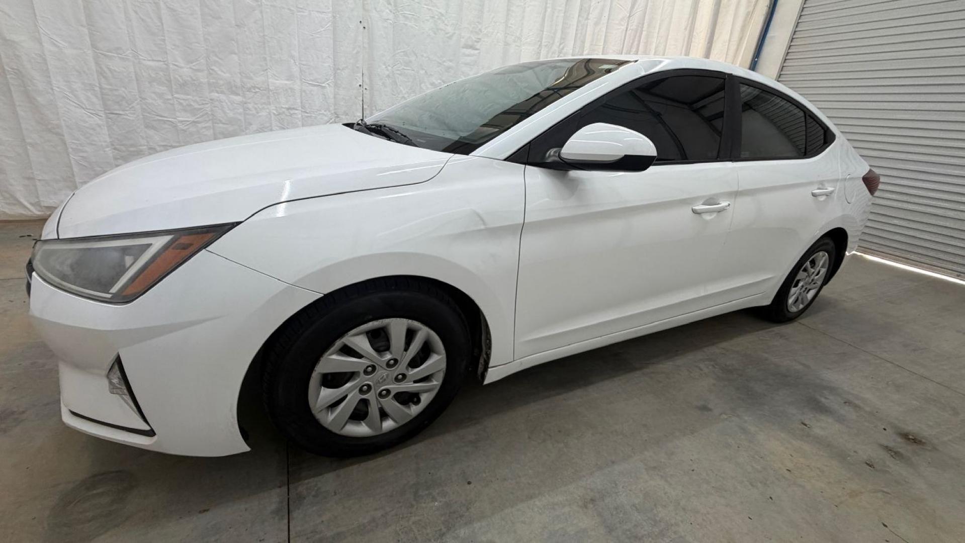 2019 White Hyundai Elantra SE 6AT (5NPD74LFXKH) with an 1.8L L4 DOHC 16V engine, 6-Speed Automatic transmission, located at 1806 Veterans Memorial Hwy SW, Austell, GA, 30168, (770) 944-9558, 33.817959, -84.606987 - Why Choose Automania? At Automania, we make car buying easy and stress-free, with over 20 years serving Austell, GA and the surrounding communities. WE FINANCE GOOD AND NOT SO GOOD CREDIT, we work with all credit types, and every vehicle comes with a free vehicle history report so you know its backg- Photo#1