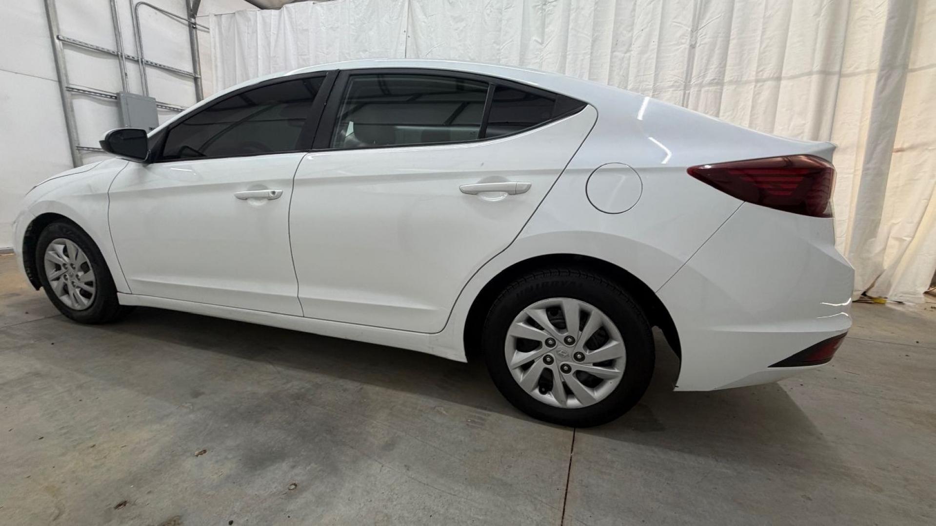 2019 White Hyundai Elantra SE 6AT (5NPD74LFXKH) with an 1.8L L4 DOHC 16V engine, 6-Speed Automatic transmission, located at 1806 Veterans Memorial Hwy SW, Austell, GA, 30168, (770) 944-9558, 33.817959, -84.606987 - Why Choose Automania? At Automania, we make car buying easy and stress-free, with over 20 years serving Austell, GA and the surrounding communities. WE FINANCE GOOD AND NOT SO GOOD CREDIT, we work with all credit types, and every vehicle comes with a free vehicle history report so you know its backg- Photo#2