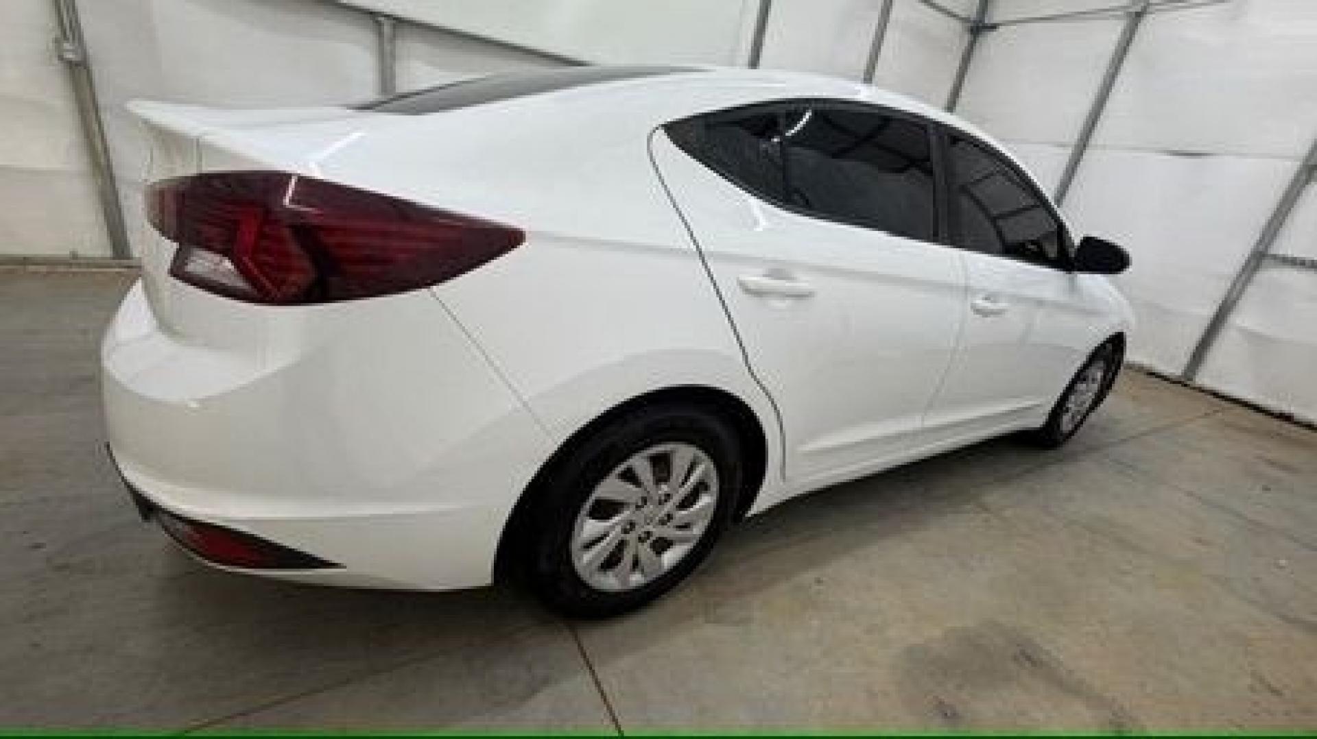 2019 White Hyundai Elantra SE 6AT (5NPD74LFXKH) with an 1.8L L4 DOHC 16V engine, 6-Speed Automatic transmission, located at 1806 Veterans Memorial Hwy SW, Austell, GA, 30168, (770) 944-9558, 33.817959, -84.606987 - Why Choose Automania? At Automania, we make car buying easy and stress-free, with over 20 years serving Austell, GA and the surrounding communities. WE FINANCE GOOD AND NOT SO GOOD CREDIT, we work with all credit types, and every vehicle comes with a free vehicle history report so you know its backg- Photo#6