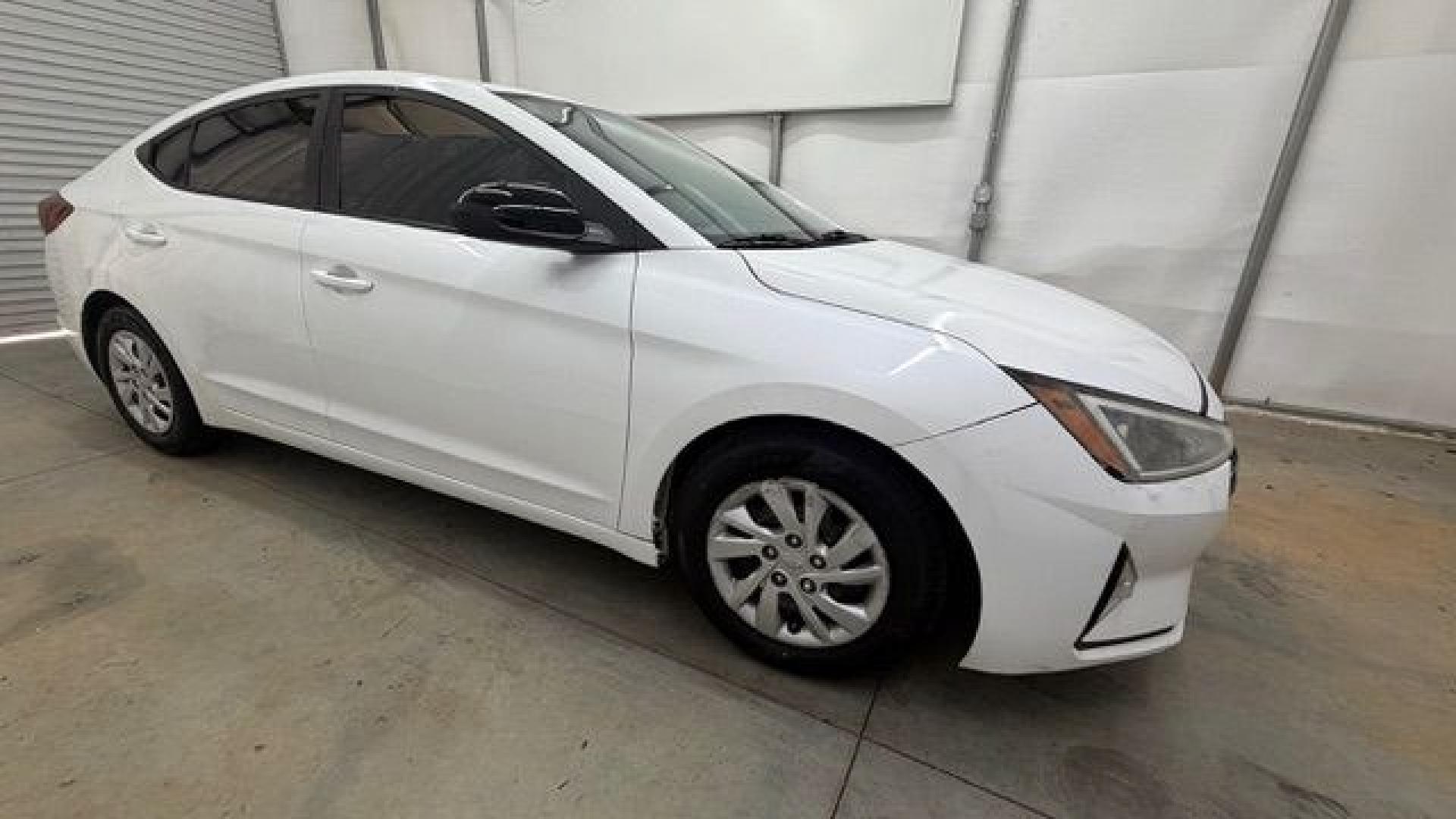 2019 White Hyundai Elantra SE 6AT (5NPD74LFXKH) with an 1.8L L4 DOHC 16V engine, 6-Speed Automatic transmission, located at 1806 Veterans Memorial Hwy SW, Austell, GA, 30168, (770) 944-9558, 33.817959, -84.606987 - Why Choose Automania? At Automania, we make car buying easy and stress-free, with over 20 years serving Austell, GA and the surrounding communities. WE FINANCE GOOD AND NOT SO GOOD CREDIT, we work with all credit types, and every vehicle comes with a free vehicle history report so you know its backg- Photo#7