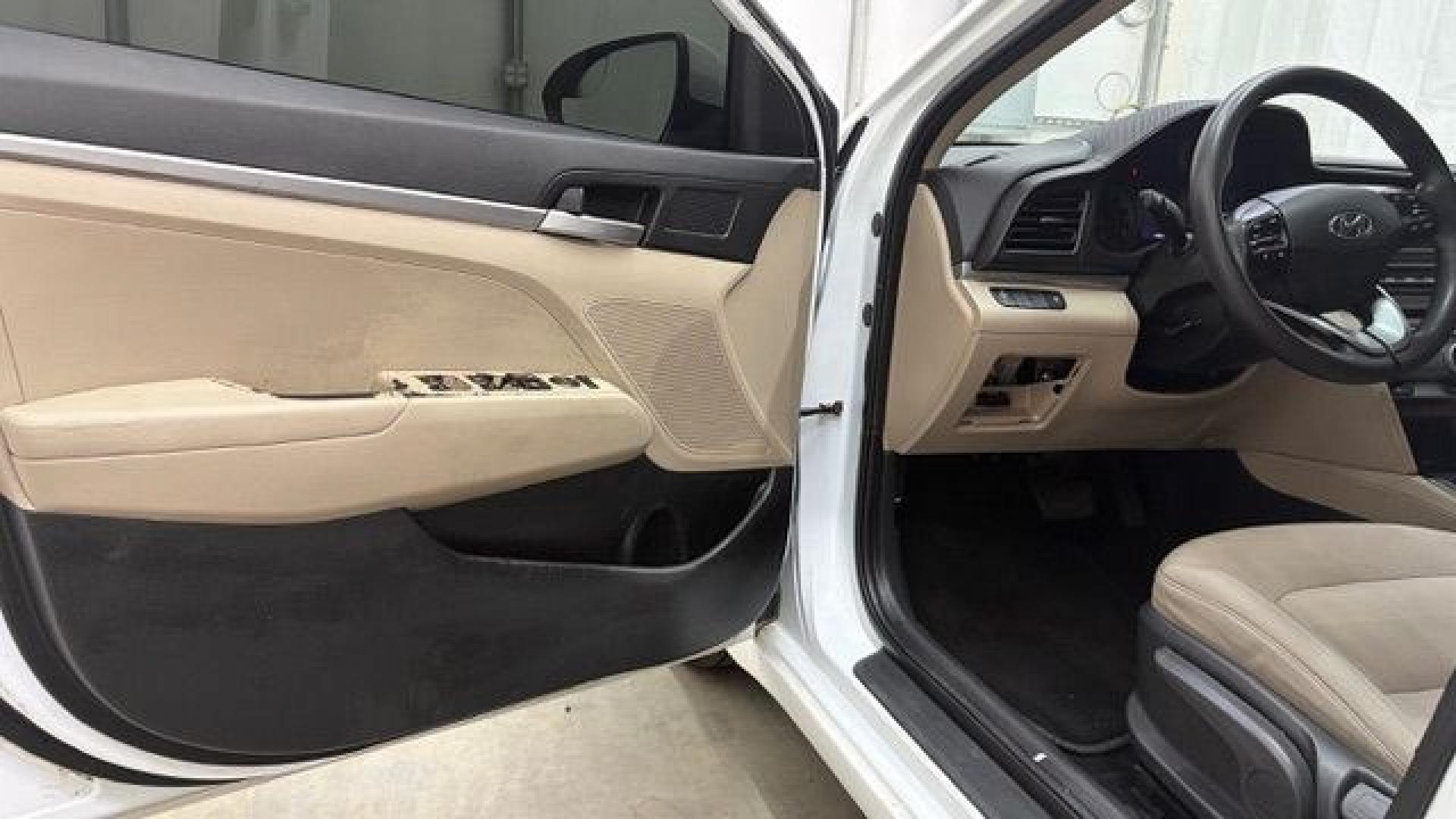 2019 White Hyundai Elantra SE 6AT (5NPD74LFXKH) with an 1.8L L4 DOHC 16V engine, 6-Speed Automatic transmission, located at 1806 Veterans Memorial Hwy SW, Austell, GA, 30168, (770) 944-9558, 33.817959, -84.606987 - Why Choose Automania? At Automania, we make car buying easy and stress-free, with over 20 years serving Austell, GA and the surrounding communities. WE FINANCE GOOD AND NOT SO GOOD CREDIT, we work with all credit types, and every vehicle comes with a free vehicle history report so you know its backg- Photo#10