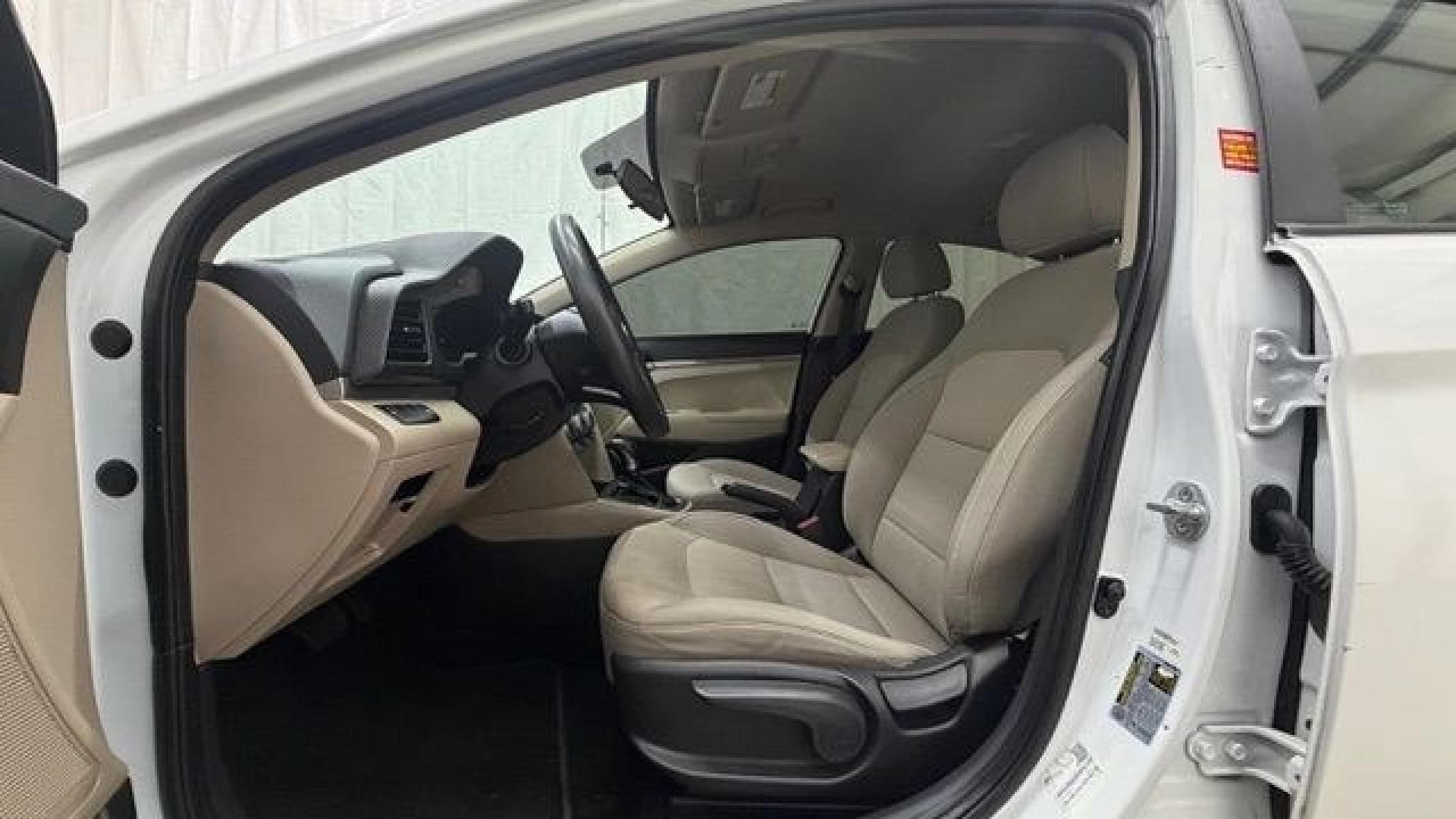 2019 White Hyundai Elantra SE 6AT (5NPD74LFXKH) with an 1.8L L4 DOHC 16V engine, 6-Speed Automatic transmission, located at 1806 Veterans Memorial Hwy SW, Austell, GA, 30168, (770) 944-9558, 33.817959, -84.606987 - Why Choose Automania? At Automania, we make car buying easy and stress-free, with over 20 years serving Austell, GA and the surrounding communities. WE FINANCE GOOD AND NOT SO GOOD CREDIT, we work with all credit types, and every vehicle comes with a free vehicle history report so you know its backg- Photo#12