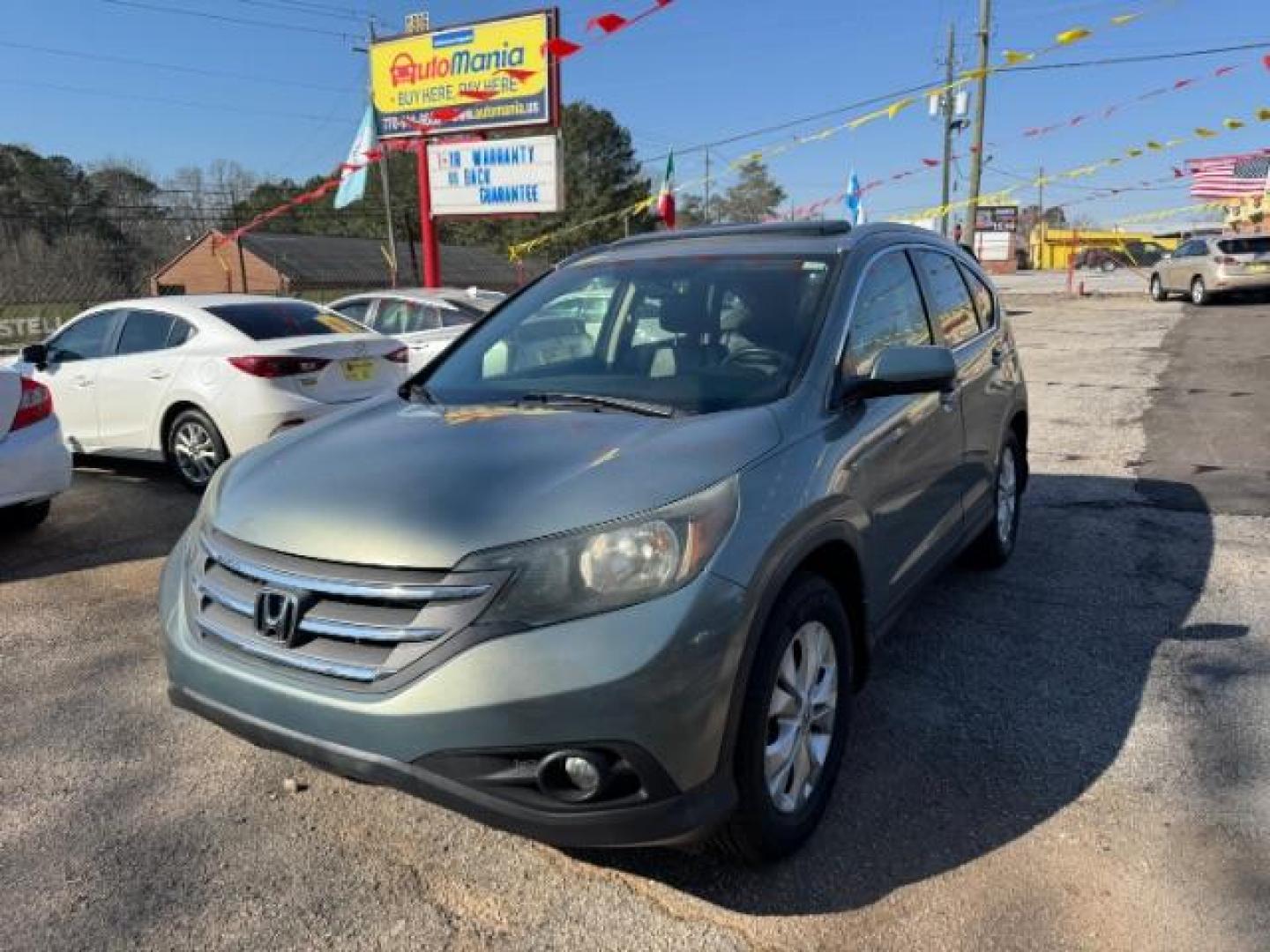 2012 Teal Honda CR-V EX-L 2WD 5-Speed AT (JHLRM3H76CC) with an 2.4L L4 DOHC 16V engine, 5-Speed Automatic transmission, located at 1806 Veterans Memorial Hwy SW, Austell, GA, 30168, (770) 944-9558, 33.817959, -84.606987 - Photo#0