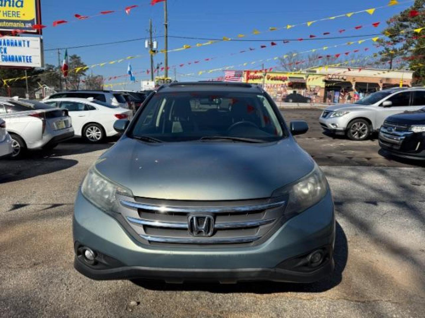2012 Teal Honda CR-V EX-L 2WD 5-Speed AT (JHLRM3H76CC) with an 2.4L L4 DOHC 16V engine, 5-Speed Automatic transmission, located at 1806 Veterans Memorial Hwy SW, Austell, GA, 30168, (770) 944-9558, 33.817959, -84.606987 - Photo#1