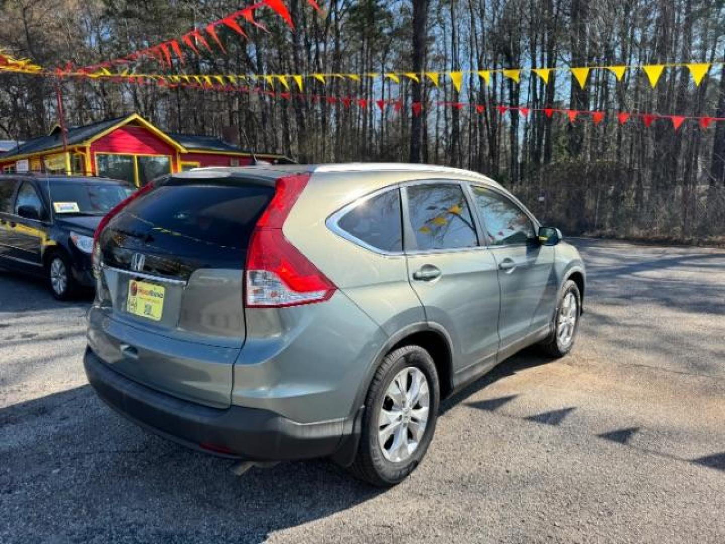 2012 Teal Honda CR-V EX-L 2WD 5-Speed AT (JHLRM3H76CC) with an 2.4L L4 DOHC 16V engine, 5-Speed Automatic transmission, located at 1806 Veterans Memorial Hwy SW, Austell, GA, 30168, (770) 944-9558, 33.817959, -84.606987 - Photo#3