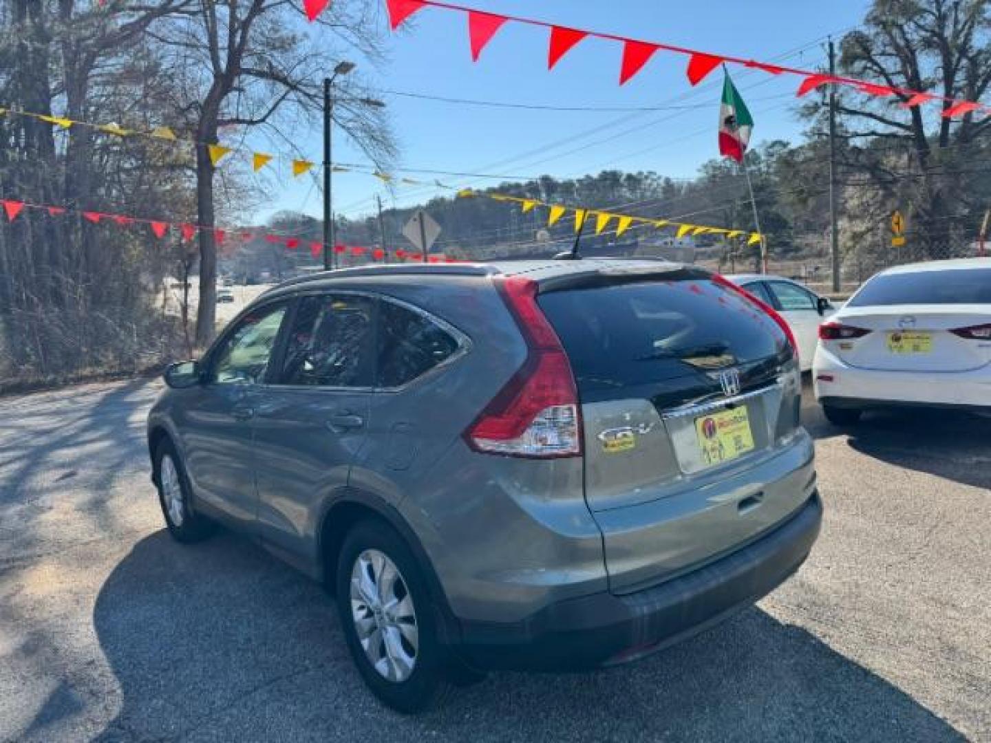 2012 Teal Honda CR-V EX-L 2WD 5-Speed AT (JHLRM3H76CC) with an 2.4L L4 DOHC 16V engine, 5-Speed Automatic transmission, located at 1806 Veterans Memorial Hwy SW, Austell, GA, 30168, (770) 944-9558, 33.817959, -84.606987 - Photo#5