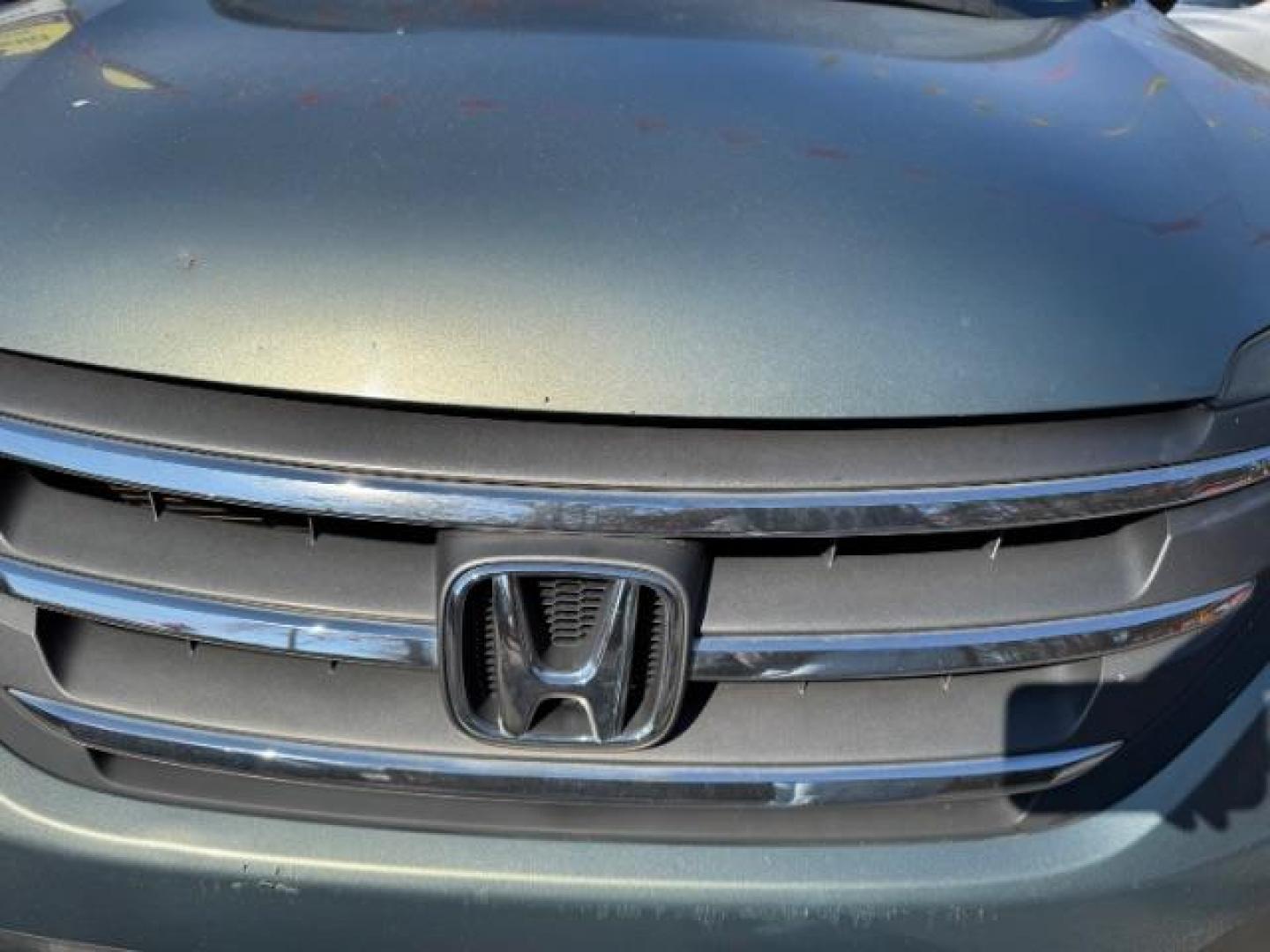 2012 Teal Honda CR-V EX-L 2WD 5-Speed AT (JHLRM3H76CC) with an 2.4L L4 DOHC 16V engine, 5-Speed Automatic transmission, located at 1806 Veterans Memorial Hwy SW, Austell, GA, 30168, (770) 944-9558, 33.817959, -84.606987 - Photo#16