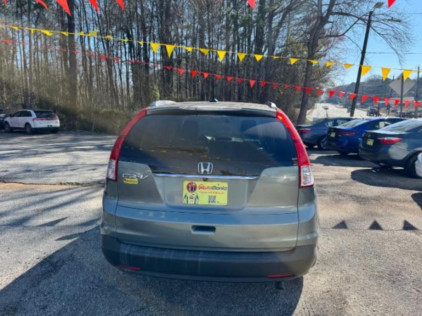 2012 Teal Honda CR-V EX-L 2WD 5-Speed AT (JHLRM3H76CC) with an 2.4L L4 DOHC 16V engine, 5-Speed Automatic transmission, located at 1806 Veterans Memorial Hwy SW, Austell, GA, 30168, (770) 944-9558, 33.817959, -84.606987 - Photo#4