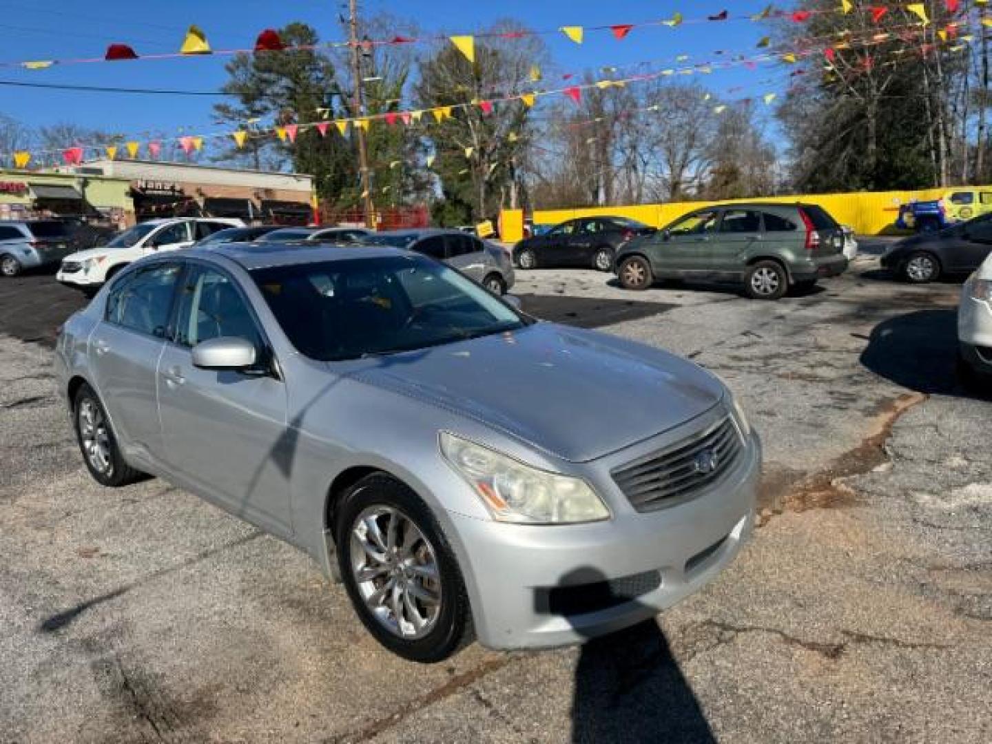 2008 Silver Infiniti G35 Journey (JNKBV61E58M) with an 3.5L V6 DOHC 24V engine, 5-Speed Automatic transmission, located at 1806 Veterans Memorial Hwy SW, Austell, GA, 30168, (770) 944-9558, 33.817959, -84.606987 - Photo#2