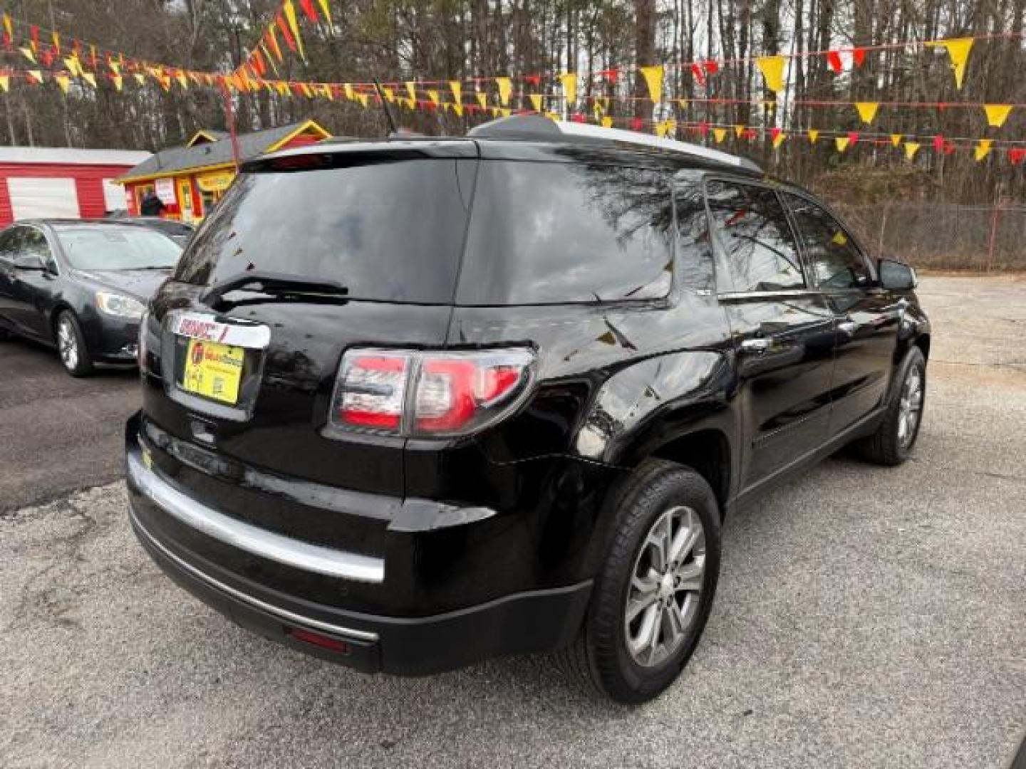 2016 Black GMC Acadia SLT-1 FWD (1GKKRRKD6GJ) with an 3.6L V6 DOHC 24V engine, 6-Speed Automatic transmission, located at 1806 Veterans Memorial Hwy SW, Austell, GA, 30168, (770) 944-9558, 33.817959, -84.606987 - Photo#5