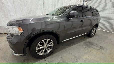2015 Gray Dodge Durango Limited 2WD (1C4RDHDG7FC) with an 3.6L V6 DOHC 24V engine, 8-Speed Automatic transmission, located at 1806 Veterans Memorial Hwy SW, Austell, GA, 30168, (770) 944-9558, 33.817959, -84.606987 - This Dodge Durango has passed a 100+ point inspection performed in our own service center. It's in great condition and runs awesome. The interior is really clean. The rear tires are new and the front tires are in good condition. The only blemish to note is a large dent on the rear quarter panel. Com- Photo#1