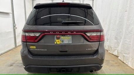 2015 Gray Dodge Durango Limited 2WD (1C4RDHDG7FC) with an 3.6L V6 DOHC 24V engine, 8-Speed Automatic transmission, located at 1806 Veterans Memorial Hwy SW, Austell, GA, 30168, (770) 944-9558, 33.817959, -84.606987 - This Dodge Durango has passed a 100+ point inspection performed in our own service center. It's in great condition and runs awesome. The interior is really clean. The rear tires are new and the front tires are in good condition. The only blemish to note is a large dent on the rear quarter panel. Com- Photo#4