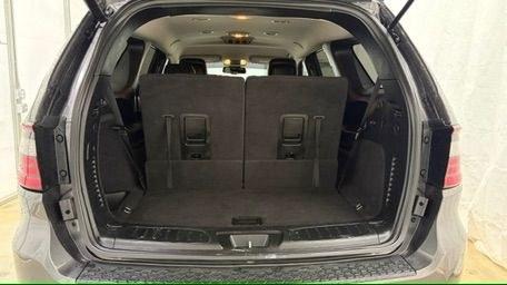 2015 Gray Dodge Durango Limited 2WD (1C4RDHDG7FC) with an 3.6L V6 DOHC 24V engine, 8-Speed Automatic transmission, located at 1806 Veterans Memorial Hwy SW, Austell, GA, 30168, (770) 944-9558, 33.817959, -84.606987 - This Dodge Durango has passed a 100+ point inspection performed in our own service center. It's in great condition and runs awesome. The interior is really clean. The rear tires are new and the front tires are in good condition. The only blemish to note is a large dent on the rear quarter panel. Com- Photo#5