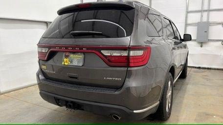 2015 Gray Dodge Durango Limited 2WD (1C4RDHDG7FC) with an 3.6L V6 DOHC 24V engine, 8-Speed Automatic transmission, located at 1806 Veterans Memorial Hwy SW, Austell, GA, 30168, (770) 944-9558, 33.817959, -84.606987 - This Dodge Durango has passed a 100+ point inspection performed in our own service center. It's in great condition and runs awesome. The interior is really clean. The rear tires are new and the front tires are in good condition. The only blemish to note is a large dent on the rear quarter panel. Com- Photo#6