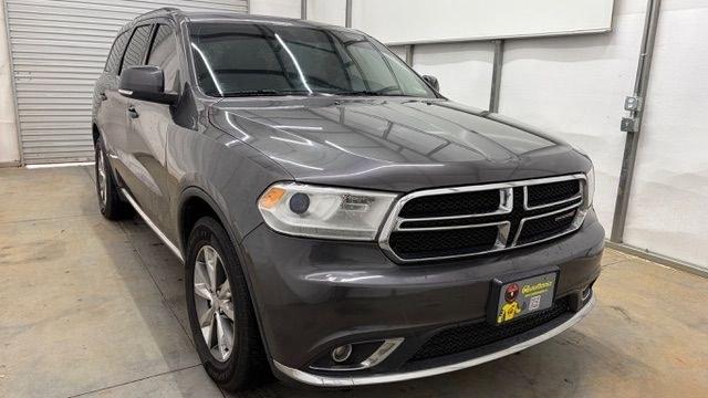 2015 Gray Dodge Durango Limited 2WD (1C4RDHDG7FC) with an 3.6L V6 DOHC 24V engine, 8-Speed Automatic transmission, located at 1806 Veterans Memorial Hwy SW, Austell, GA, 30168, (770) 944-9558, 33.817959, -84.606987 - This Dodge Durango has passed a 100+ point inspection performed in our own service center. It's in great condition and runs awesome. The interior is really clean. The rear tires are new and the front tires are in good condition. The only blemish to note is a large dent on the rear quarter panel. Com- Photo#9