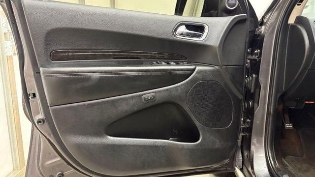 2015 Gray Dodge Durango Limited 2WD (1C4RDHDG7FC) with an 3.6L V6 DOHC 24V engine, 8-Speed Automatic transmission, located at 1806 Veterans Memorial Hwy SW, Austell, GA, 30168, (770) 944-9558, 33.817959, -84.606987 - This Dodge Durango has passed a 100+ point inspection performed in our own service center. It's in great condition and runs awesome. The interior is really clean. The rear tires are new and the front tires are in good condition. The only blemish to note is a large dent on the rear quarter panel. Com- Photo#11