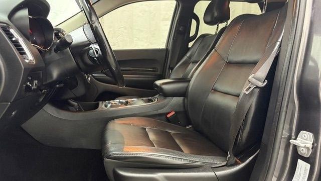 2015 Gray Dodge Durango Limited 2WD (1C4RDHDG7FC) with an 3.6L V6 DOHC 24V engine, 8-Speed Automatic transmission, located at 1806 Veterans Memorial Hwy SW, Austell, GA, 30168, (770) 944-9558, 33.817959, -84.606987 - This Dodge Durango has passed a 100+ point inspection performed in our own service center. It's in great condition and runs awesome. The interior is really clean. The rear tires are new and the front tires are in good condition. The only blemish to note is a large dent on the rear quarter panel. Com- Photo#12