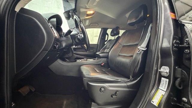 2015 Gray Dodge Durango Limited 2WD (1C4RDHDG7FC) with an 3.6L V6 DOHC 24V engine, 8-Speed Automatic transmission, located at 1806 Veterans Memorial Hwy SW, Austell, GA, 30168, (770) 944-9558, 33.817959, -84.606987 - This Dodge Durango has passed a 100+ point inspection performed in our own service center. It's in great condition and runs awesome. The interior is really clean. The rear tires are new and the front tires are in good condition. The only blemish to note is a large dent on the rear quarter panel. Com- Photo#13